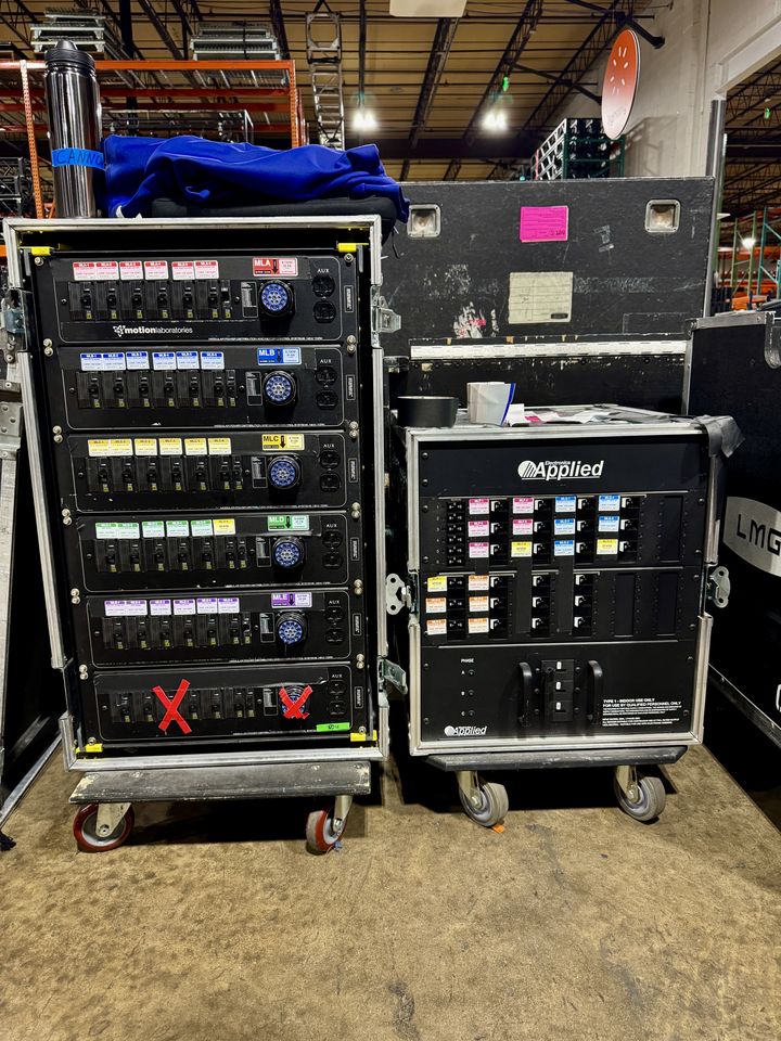 Labeled power distro racks prepped in the shop